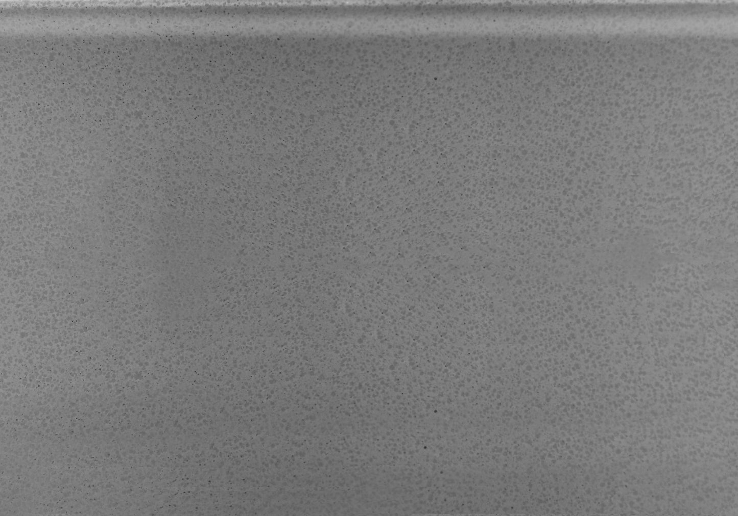 Textured grey countertop sample with speckled finish suitable for kitchens