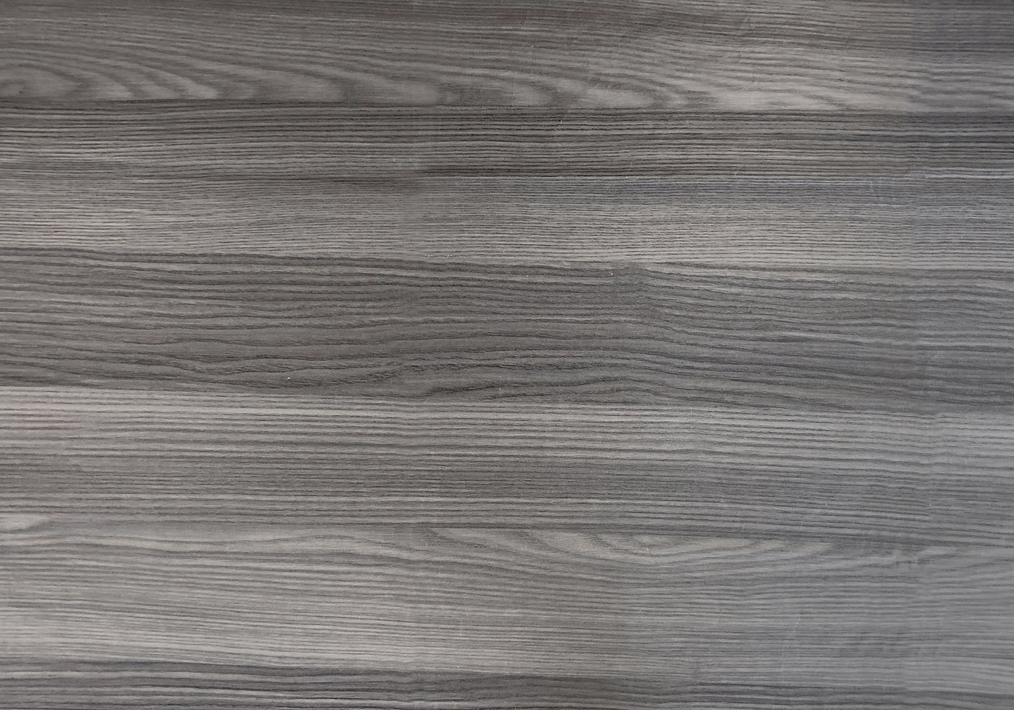 Distressed grey wood plank texture with horizontal grain ideal for flooring