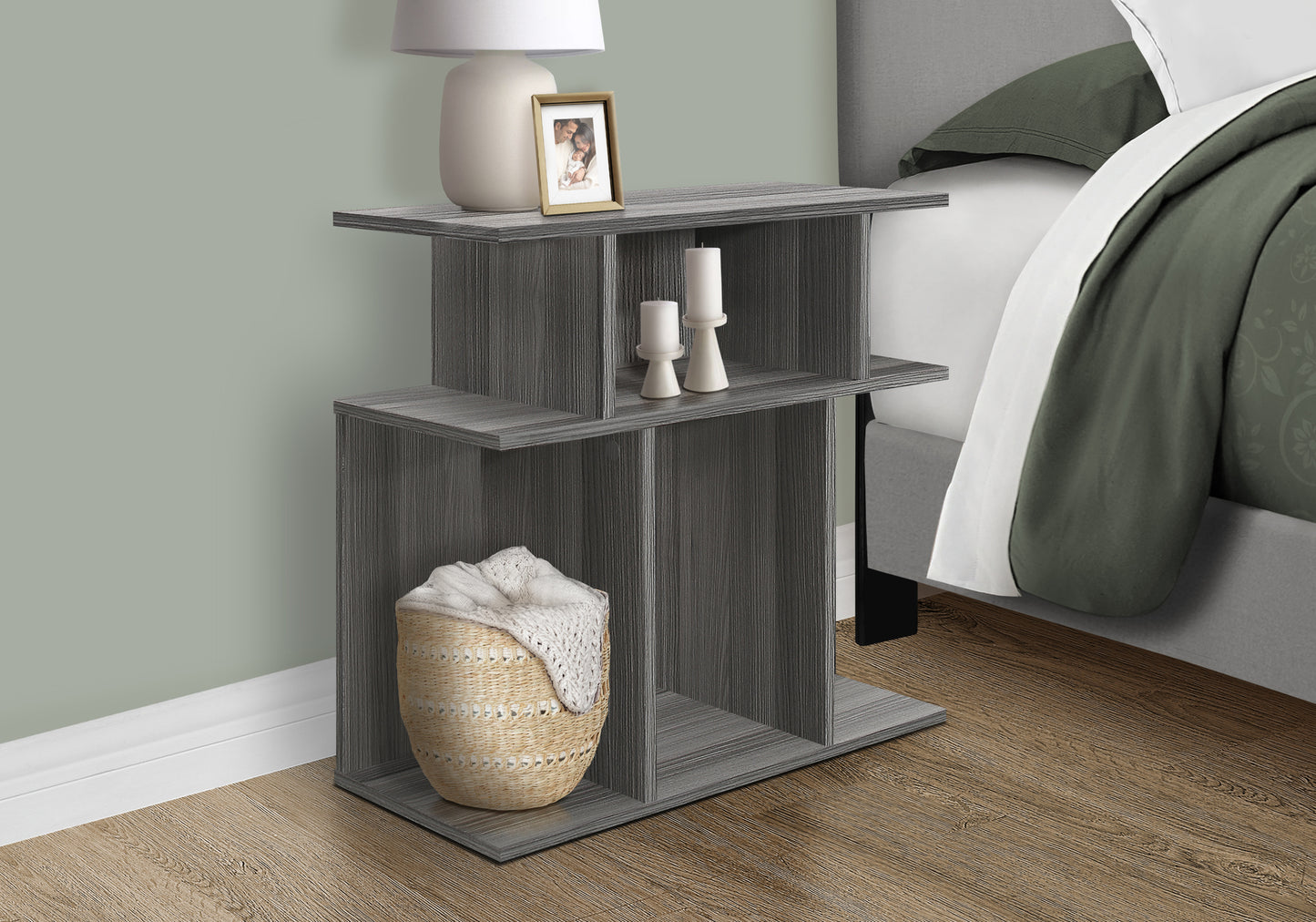 Grey woodgrain nightstand with open shelves holding decor and basket