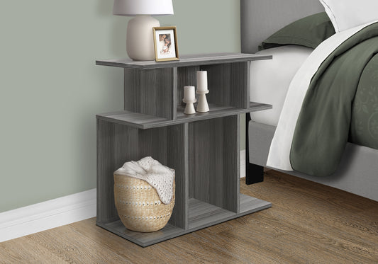 Grey woodgrain nightstand with open shelves holding decor and basket