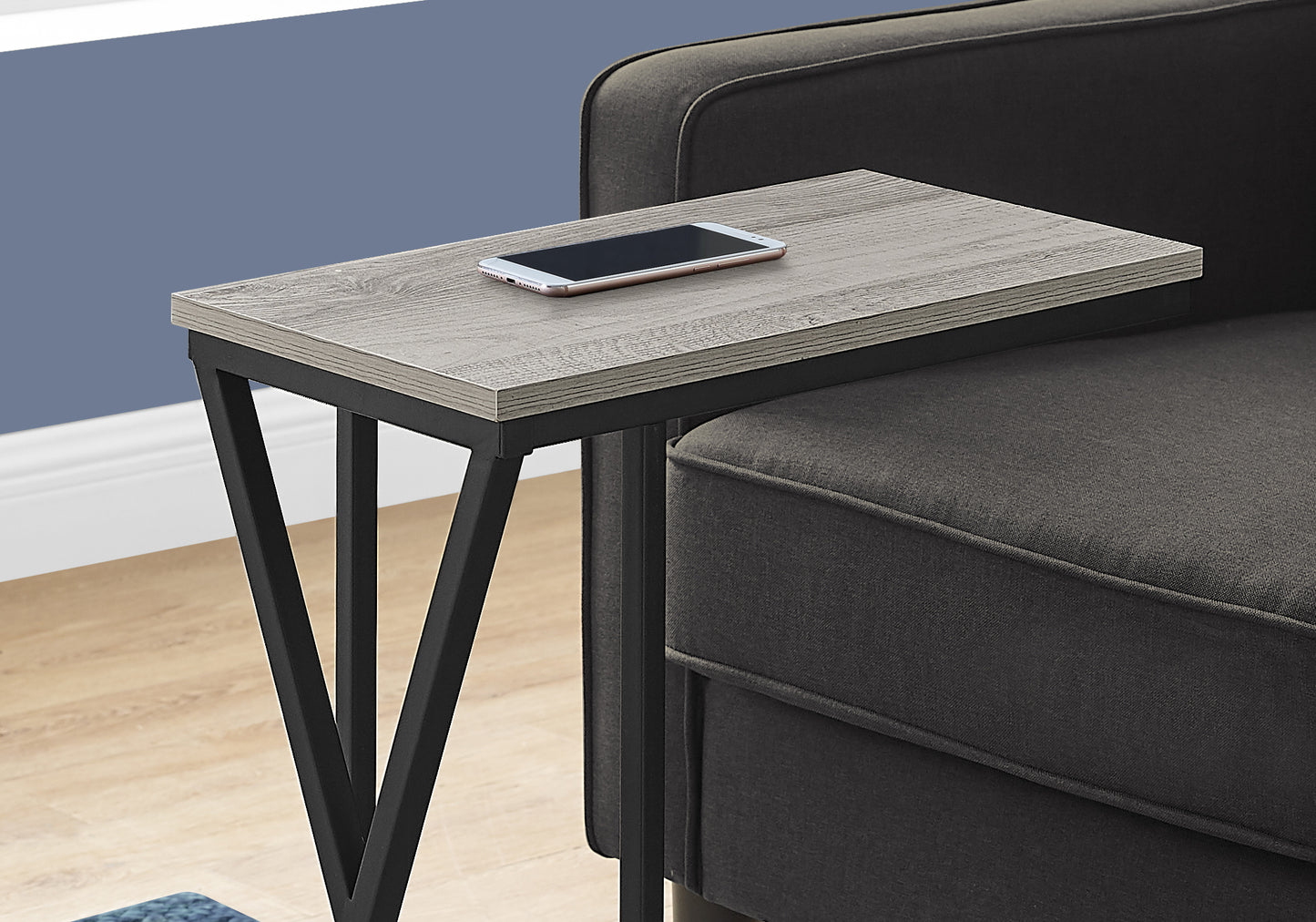 Grey wood grain accent table with black metal frame perfect for small spaces