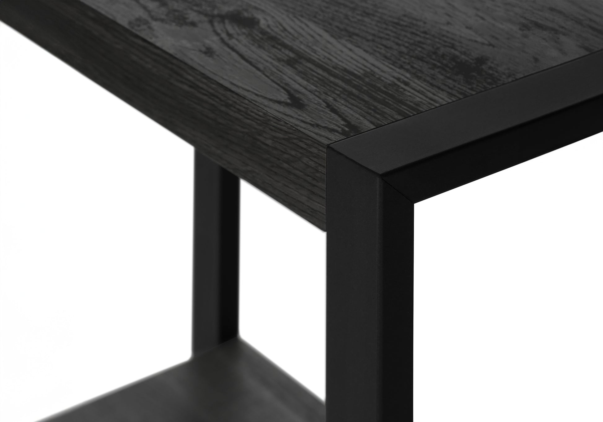 Dark wood grain end table with black metal frame corner detail