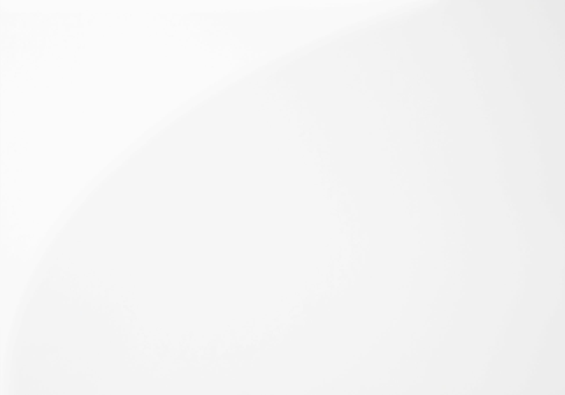Sleek modern white ceramic tile with a glossy finish