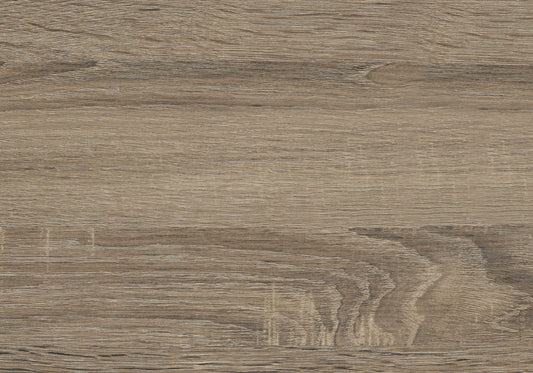 Closeup of taupe wood grain laminate flooring with distinct lines and subtle knots