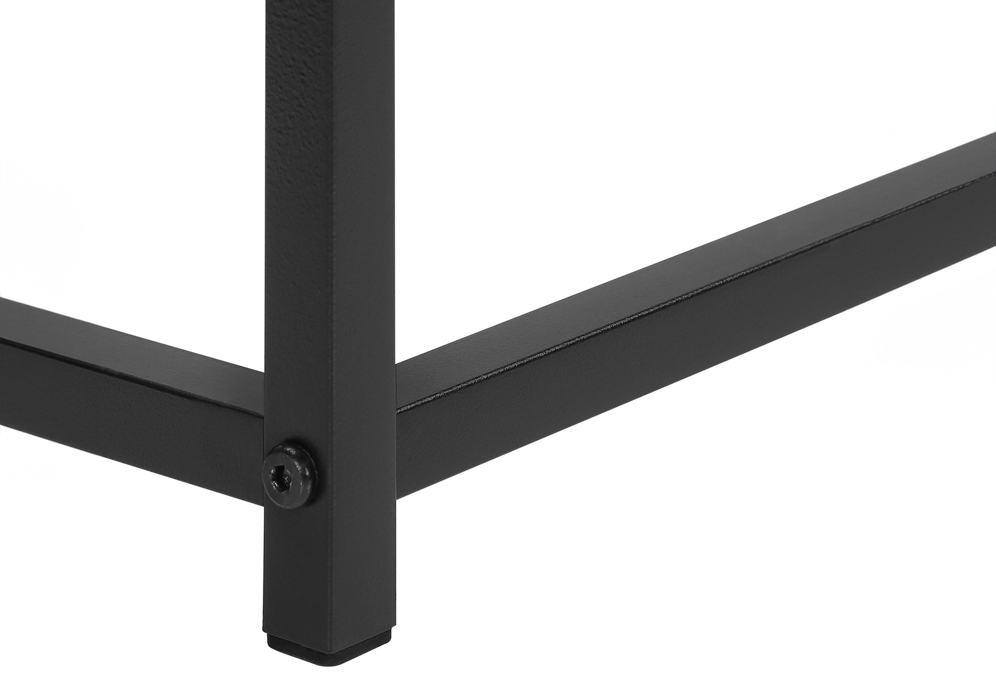 Closeup of black metal desk leg with screw detail showing sturdy construction for office furniture