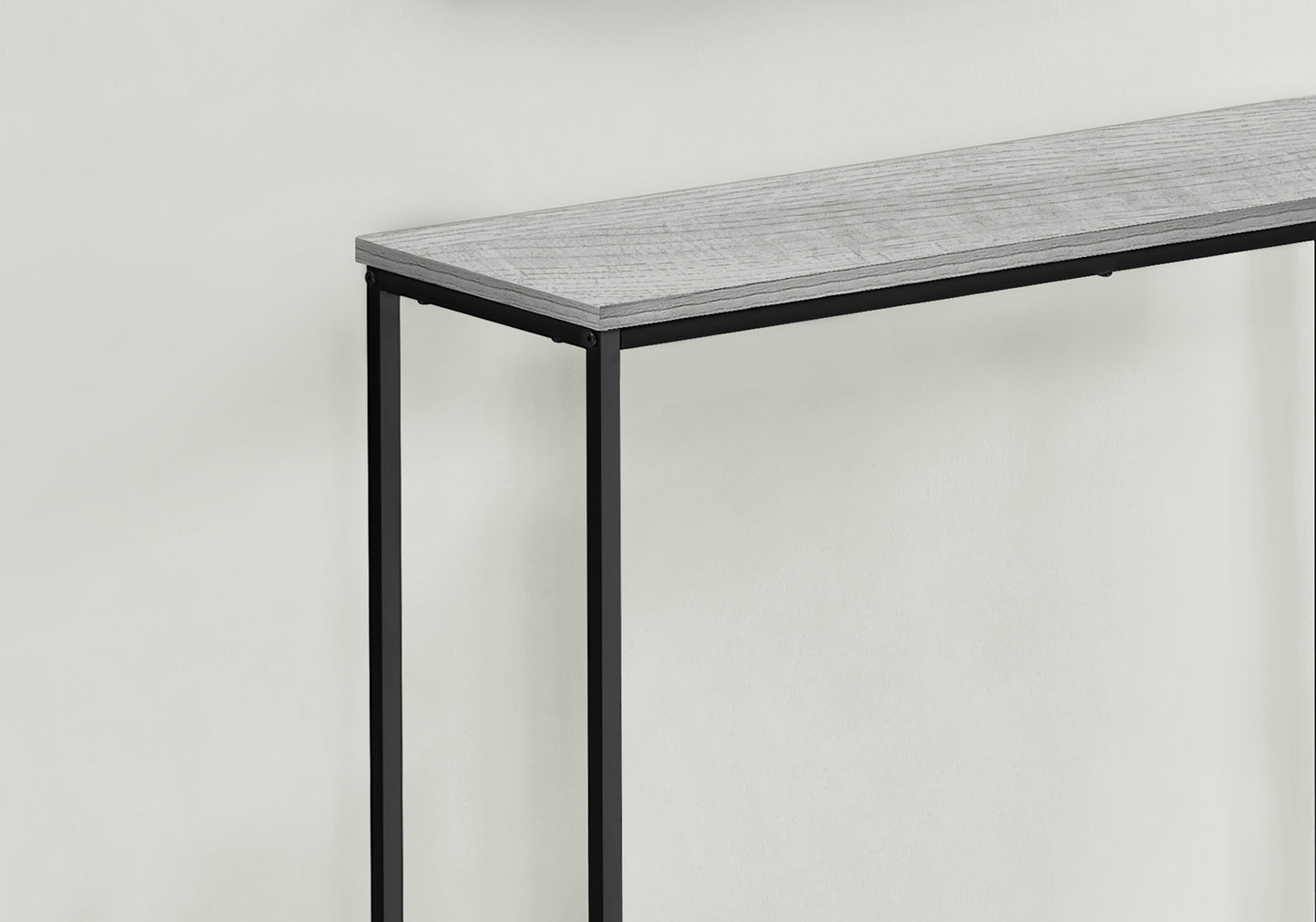 Slim grey wood top console table with black metal legs