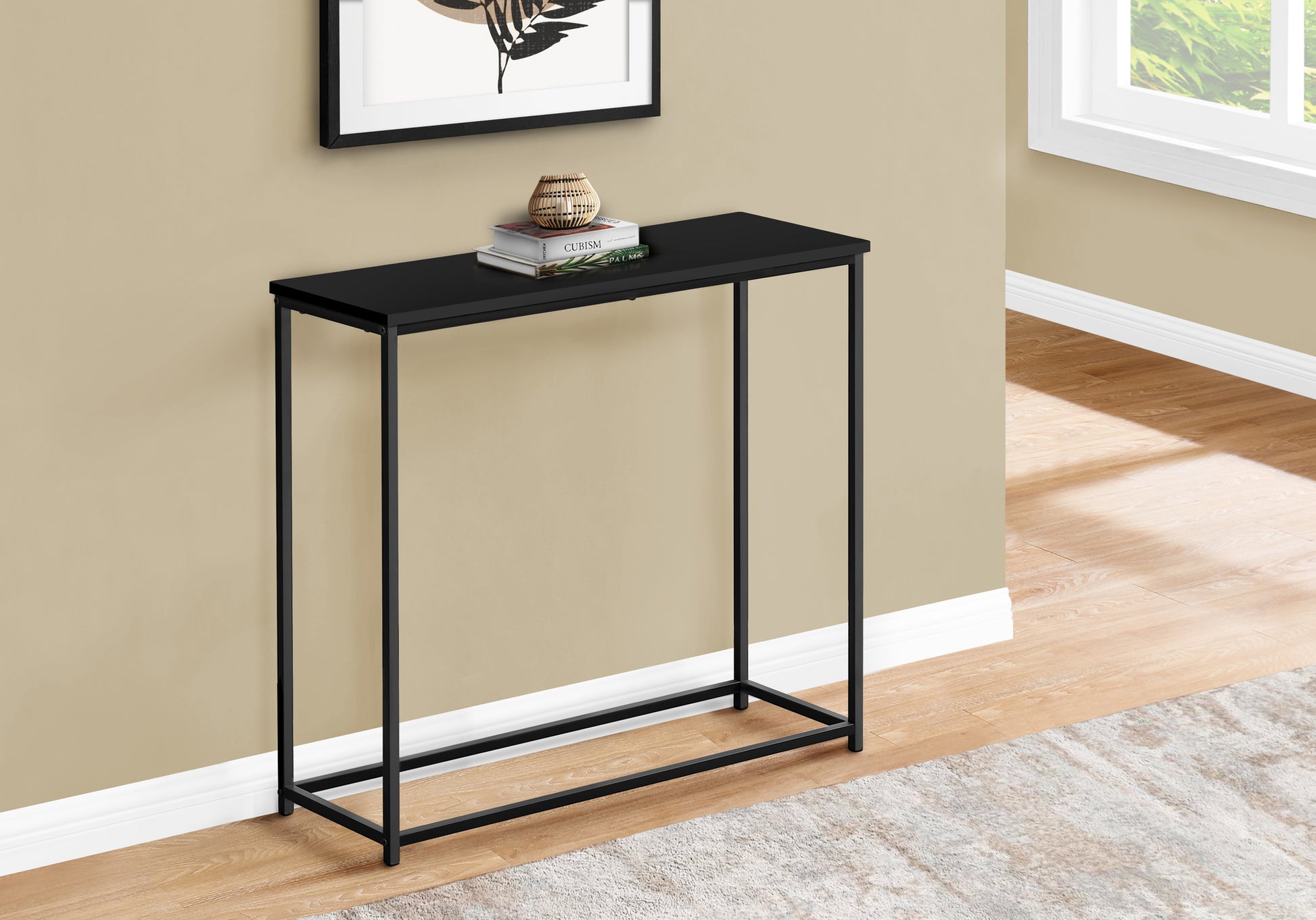 Sleek black metal frame console table with a slender minimalist design