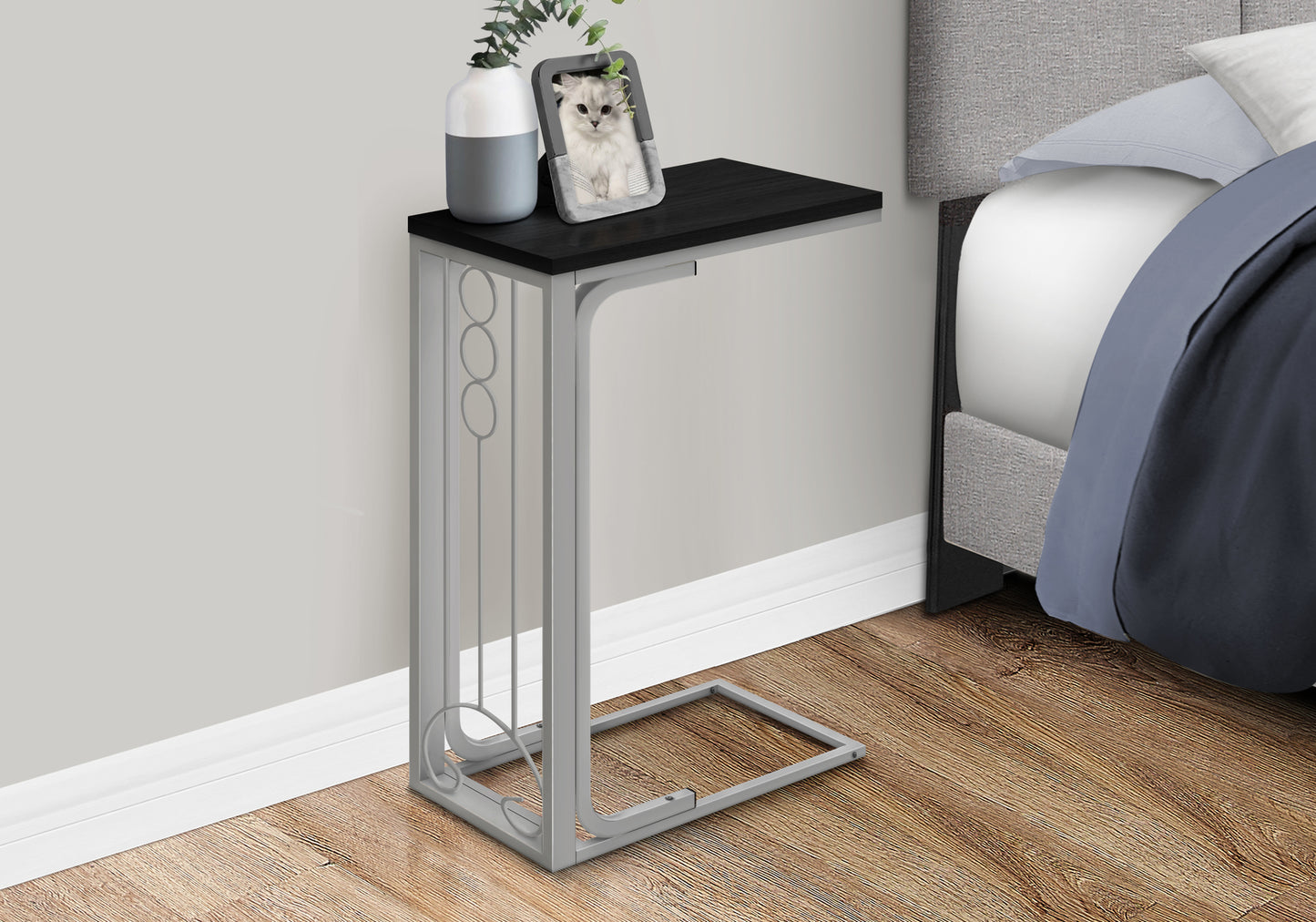 Modern Ctable with black wood top and silver metal frame perfect for small spaces