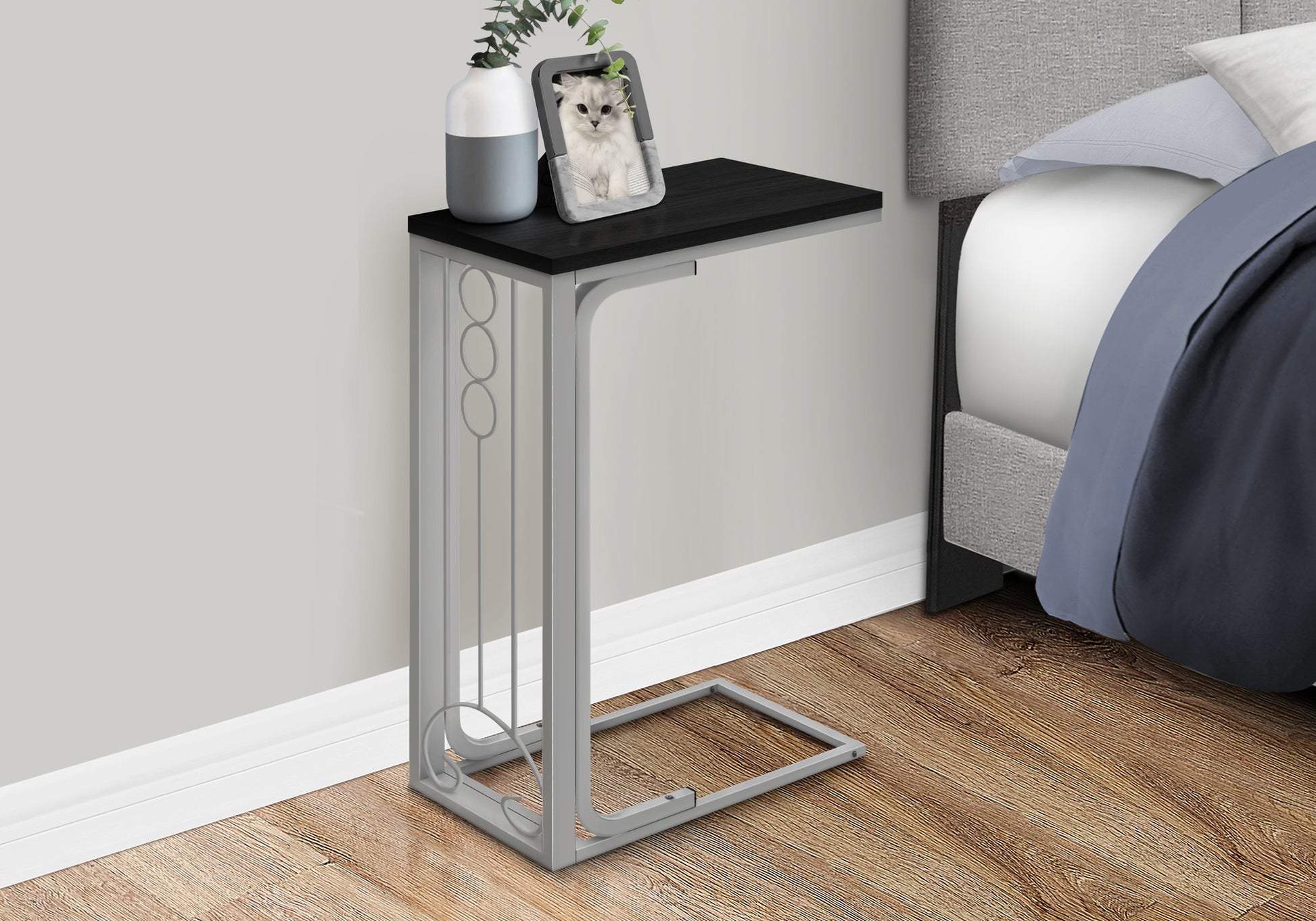 Modern Ctable with black wood top and silver metal frame perfect for small spaces