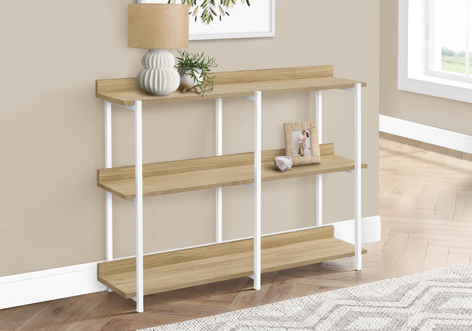 Modern threetier hallway console table with light wood shelves and white metal frame