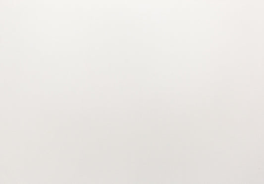 A minimalist white ceramic coffee mug with a smooth matte finish