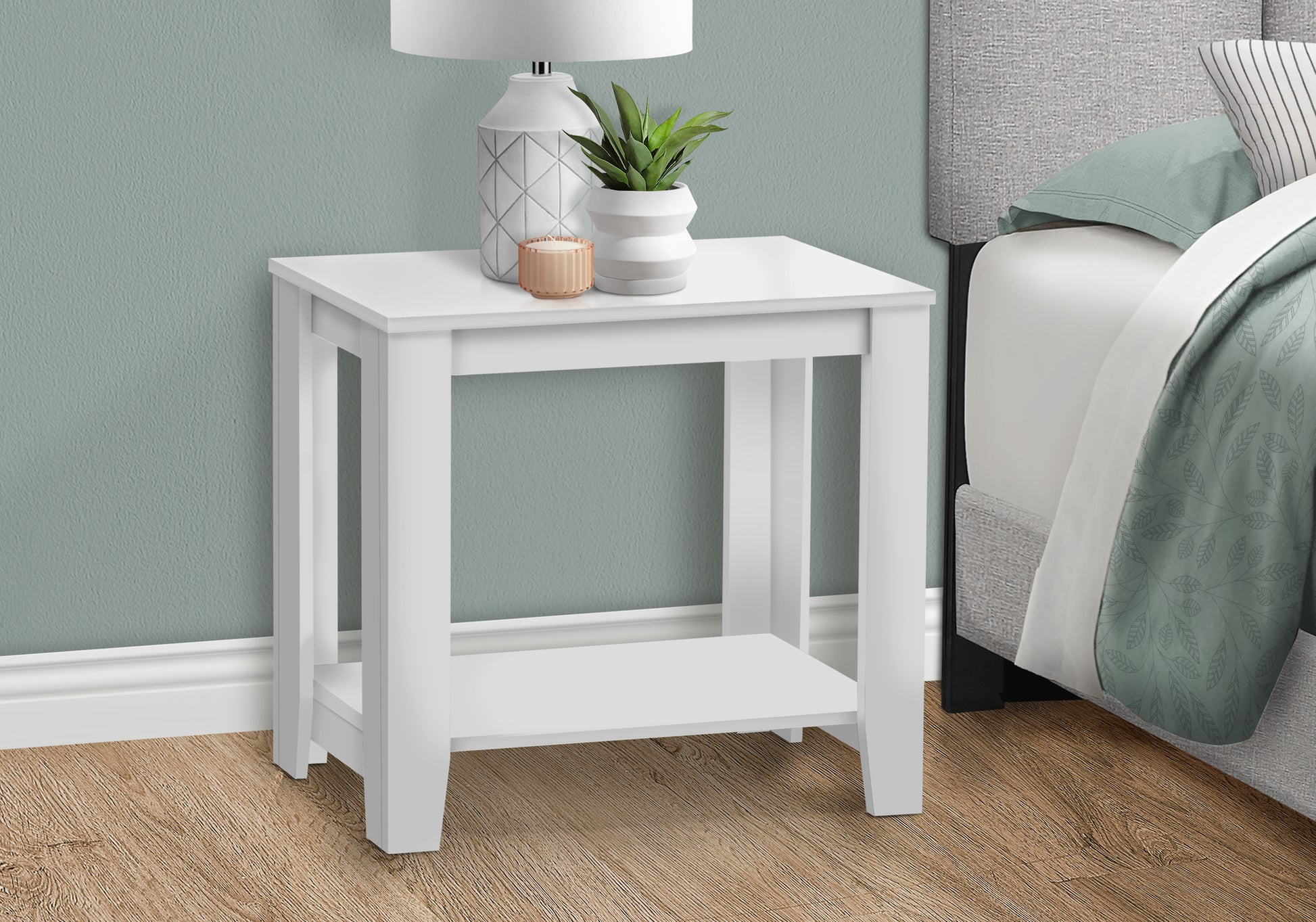 Modern white end table with a lower shelf perfect for a bedroom nightstand