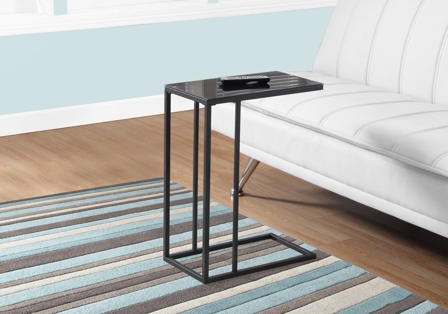 Black glass top ctable with metal frame perfect as a couch side table