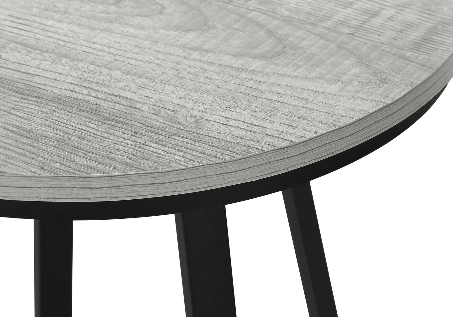 Round grey wood top accent table with black metal legs