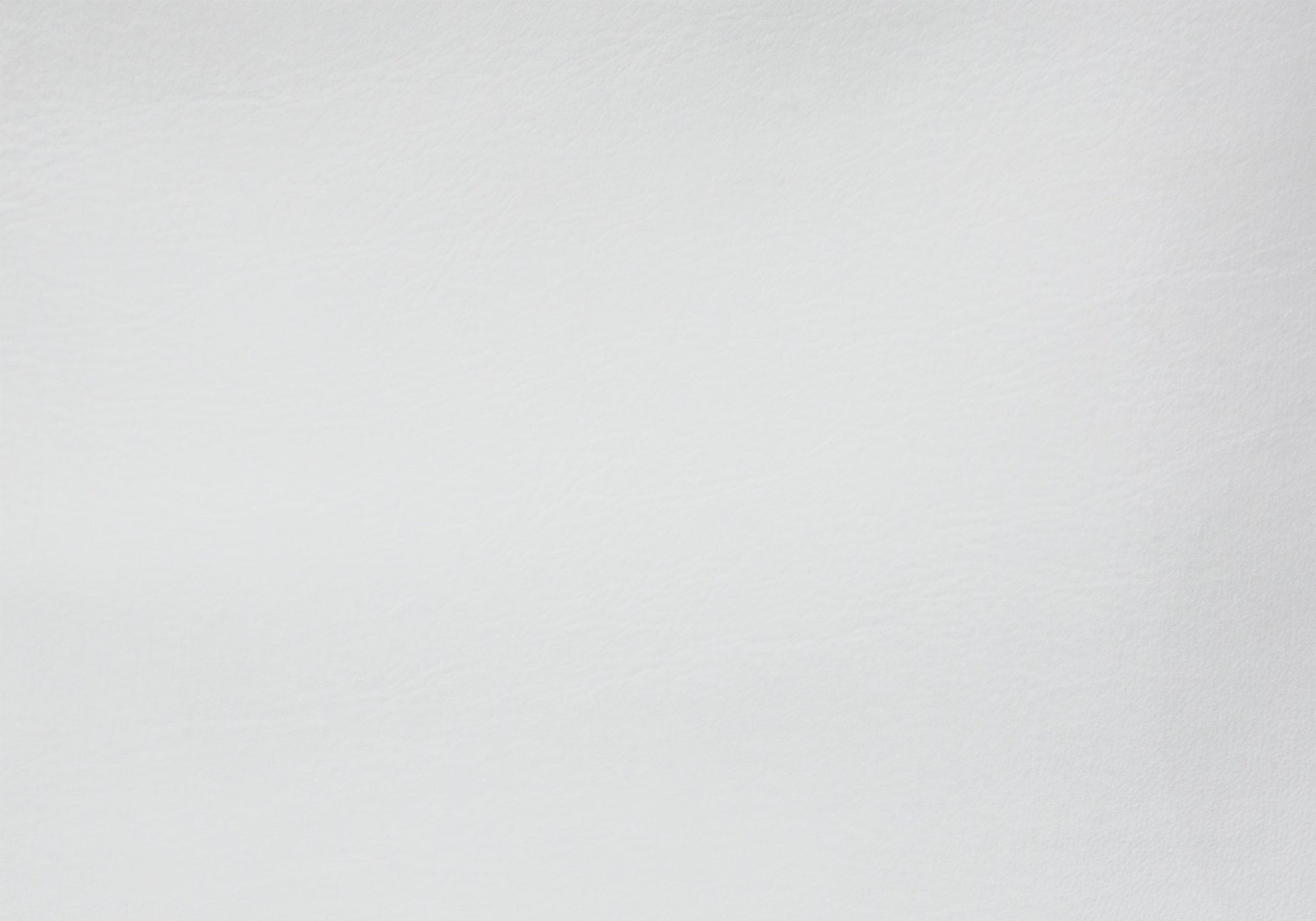 Textured white faux leather upholstery fabric sample ideal for furniture