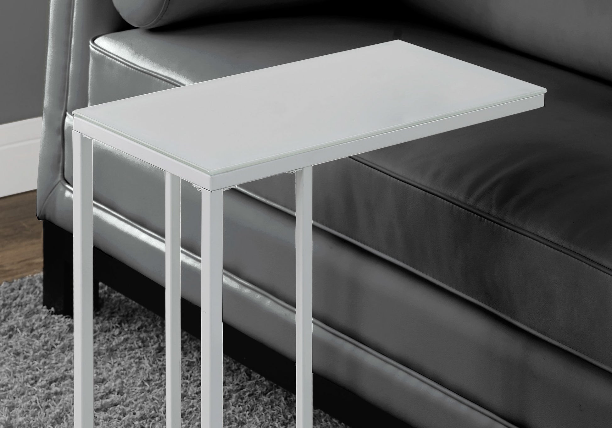 Modern white Ctable with frosted glass top and metal frame perfect for living room use