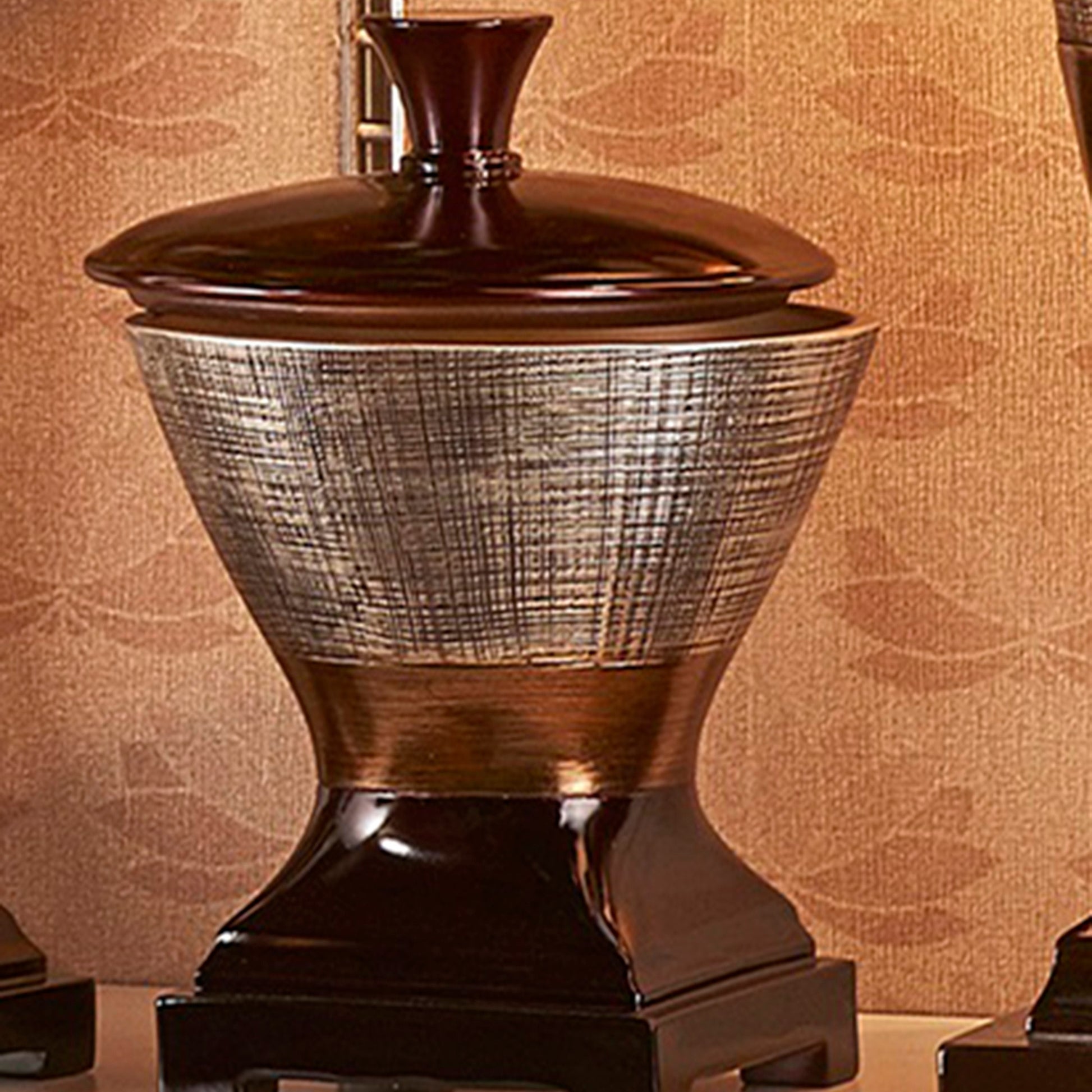 Textured ceramic decorative urn with dark brown lid and base