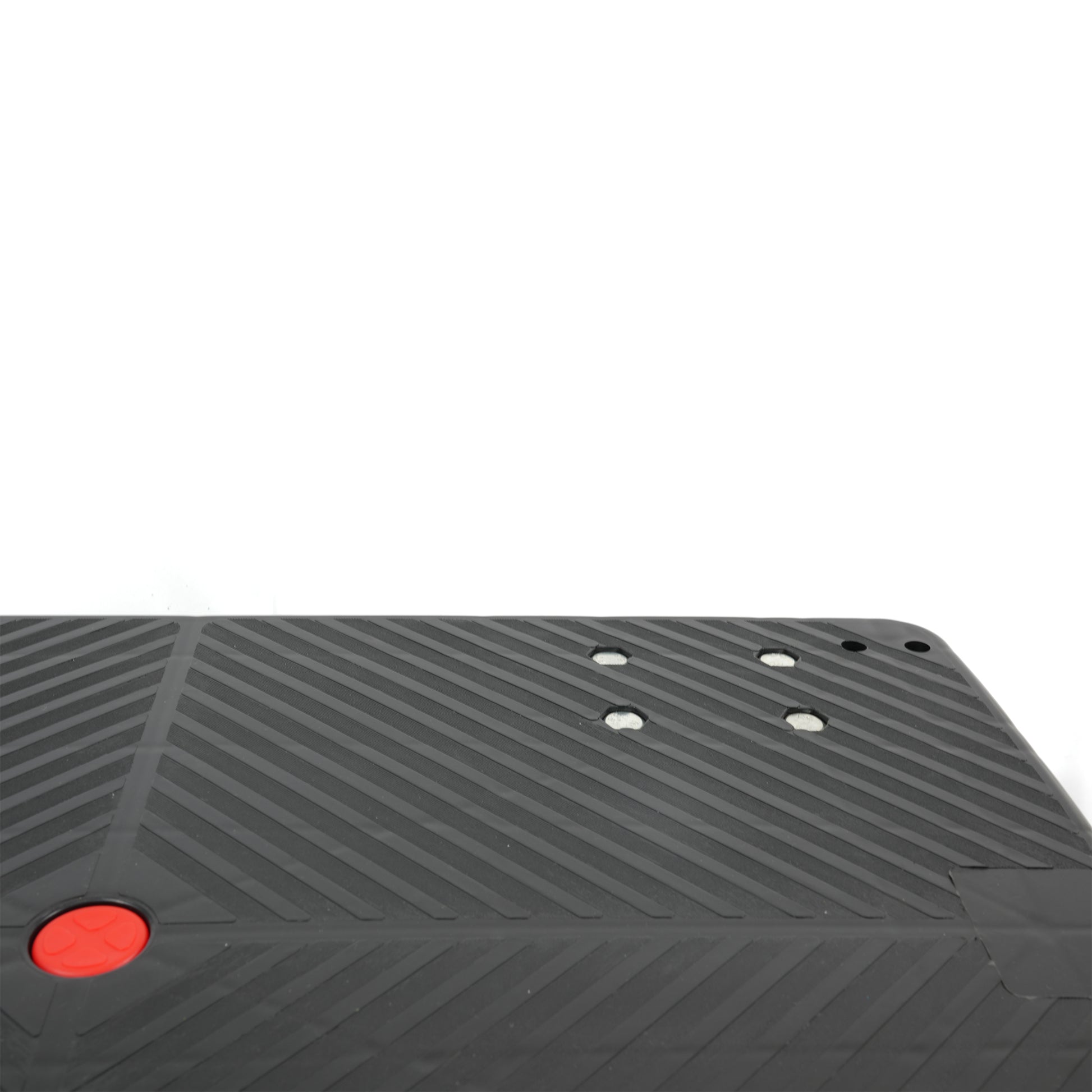 Black textured exercise stepper with red button accent suitable for home workouts