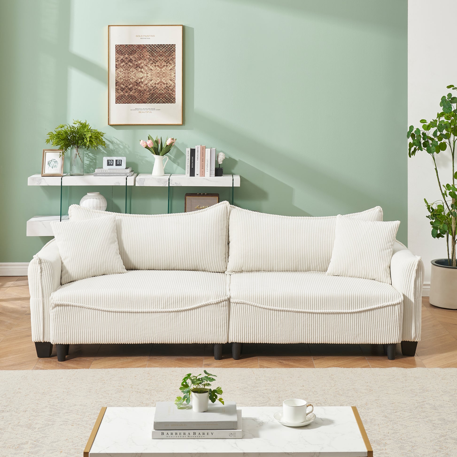 Offwhite corduroy sofa with plush cushions and modern design perfect for living rooms