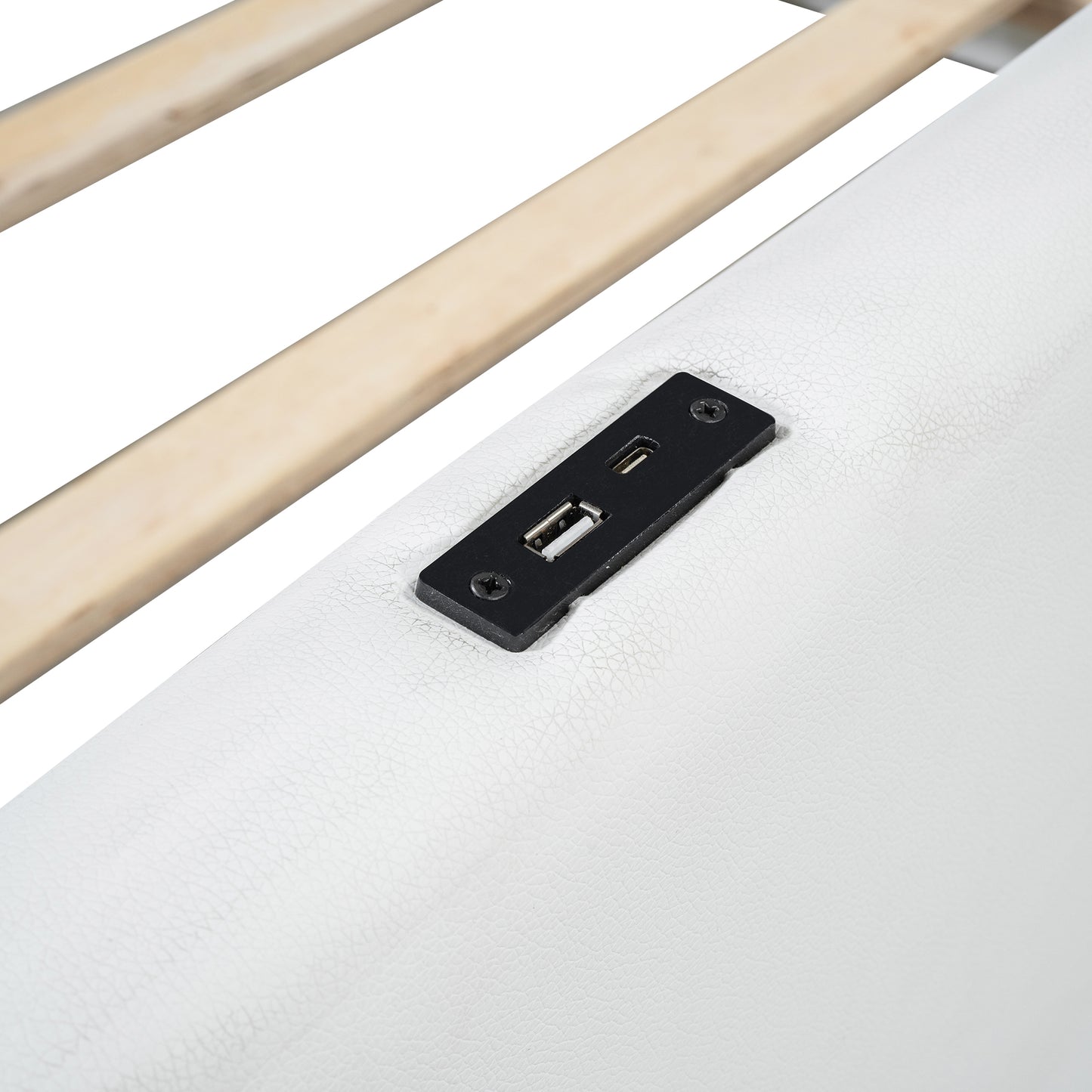 White faux leather bed frame with integrated USB charging ports and wooden slats