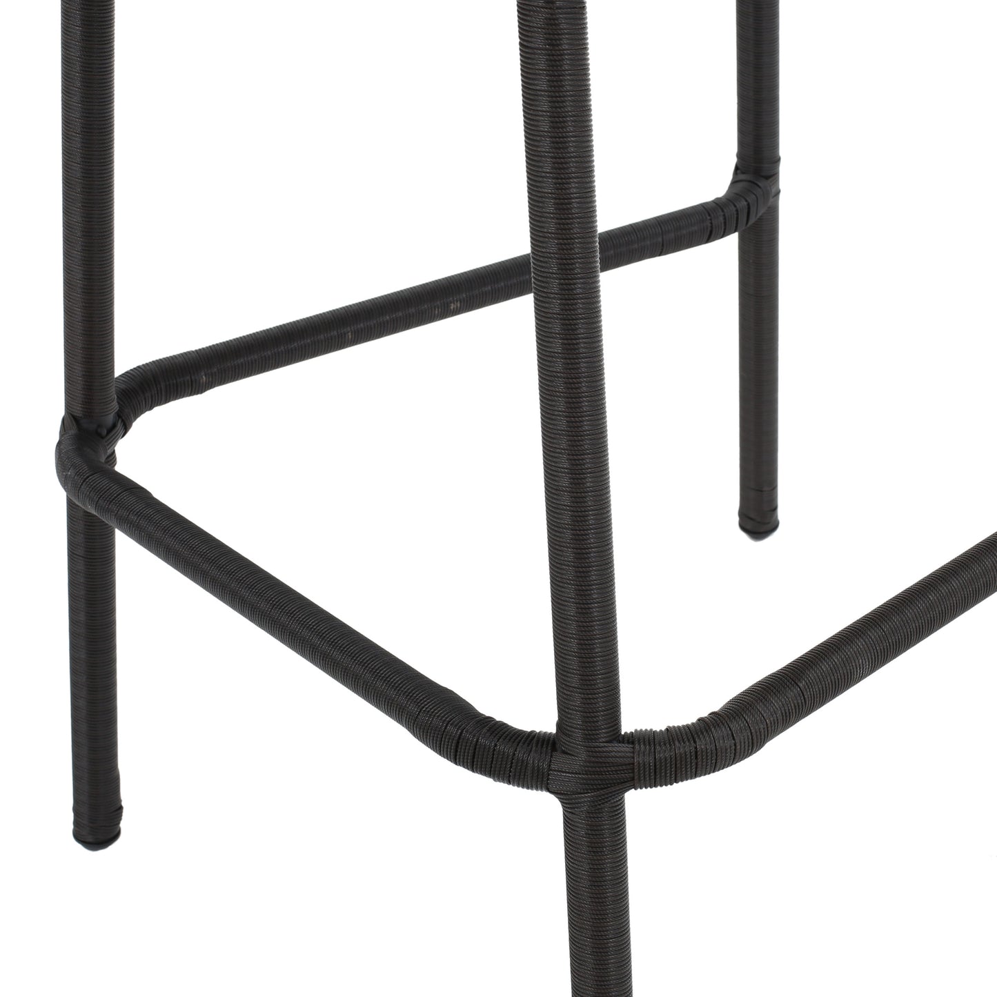 Closeup of dark brown woven rattan bar stool base with metal frame support