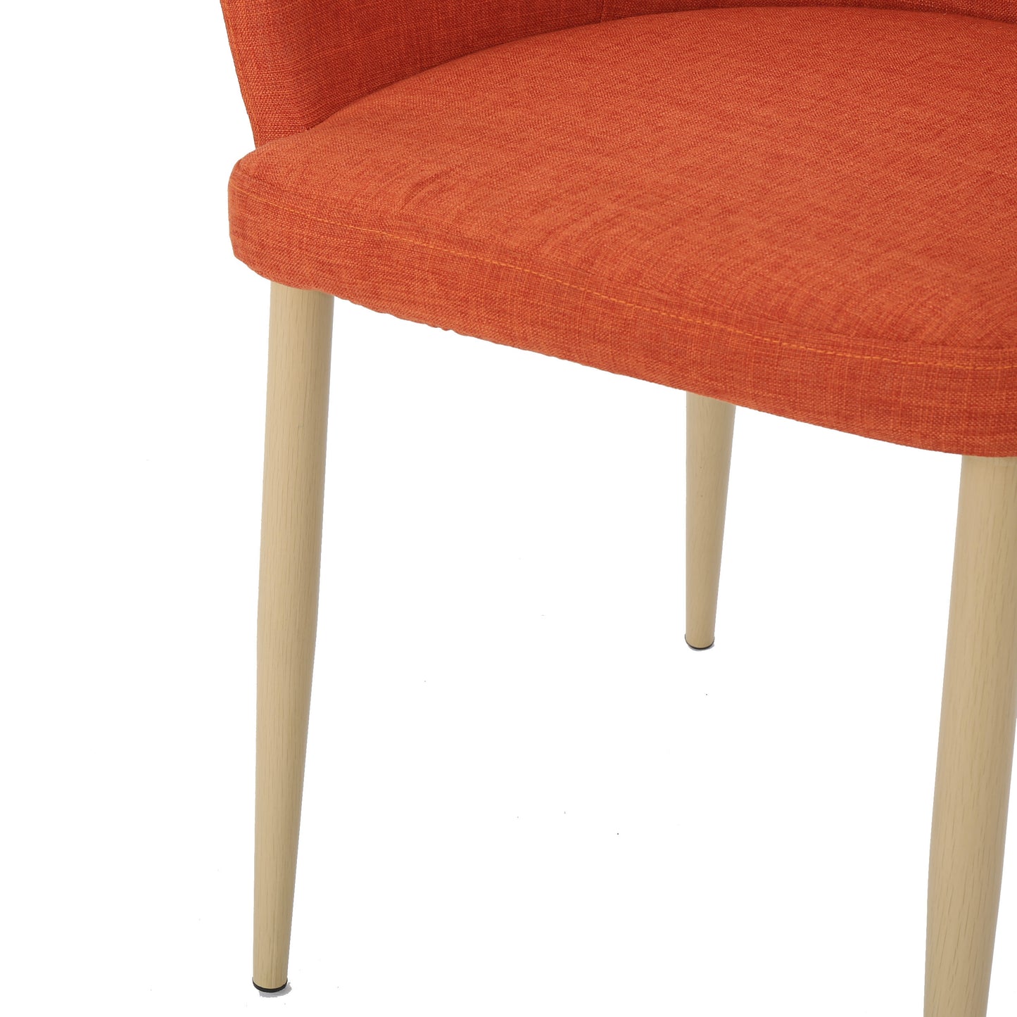 Closeup of an orange upholstered chair seat with light wood legs ideal for dining rooms
