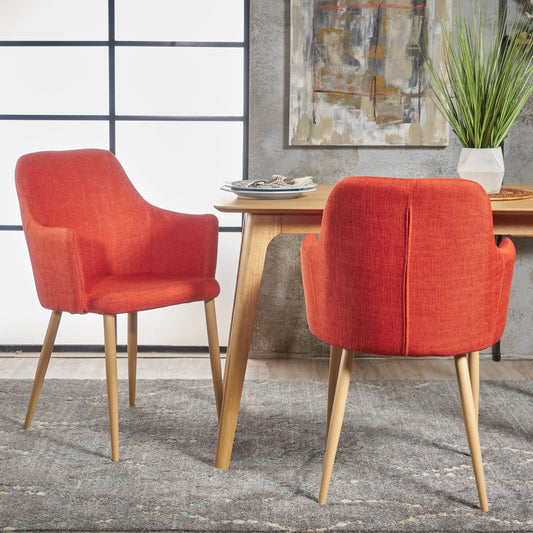 Orange fabric dining chair with light wood legs modern design
