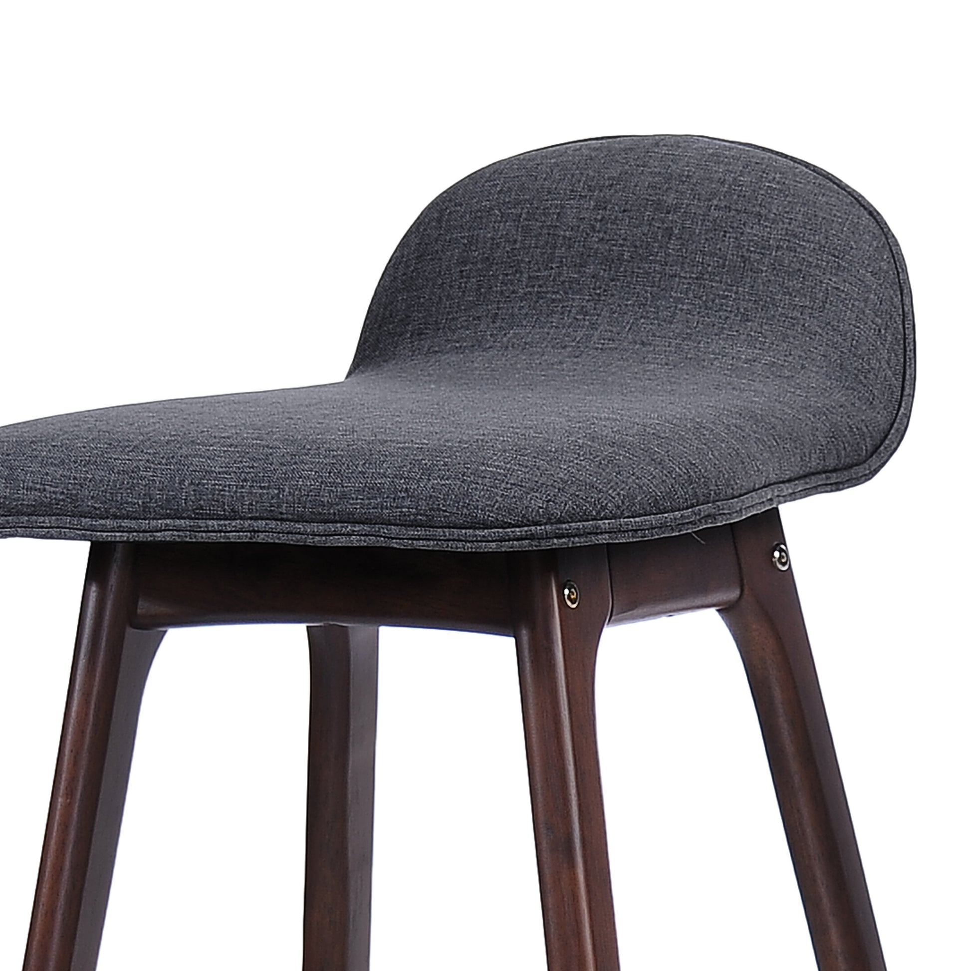 Closeup of a modern grey fabric bar stool with dark wood legs and a curved seat