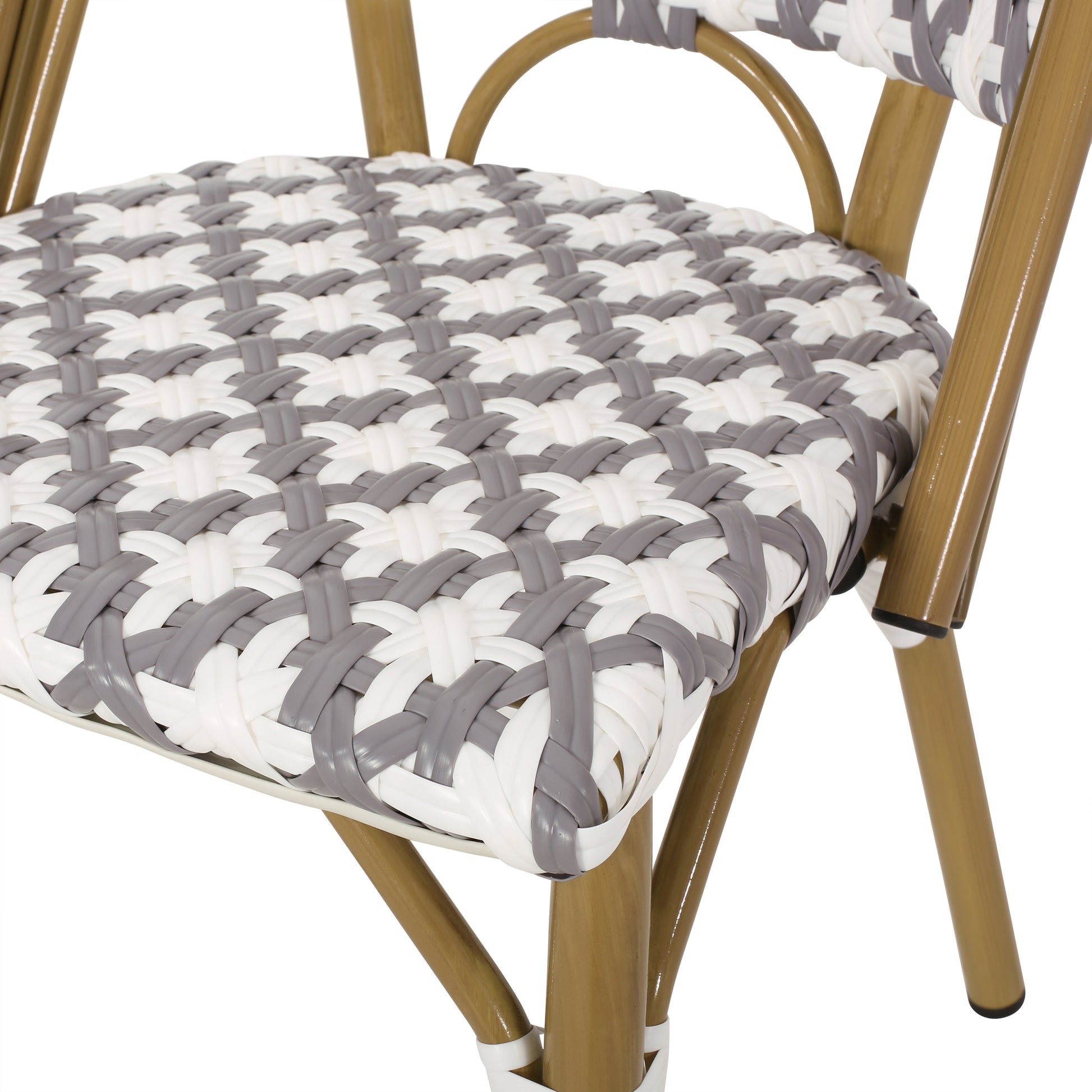Closeup of a white and gray woven bistro chair seat with a faux rattan design