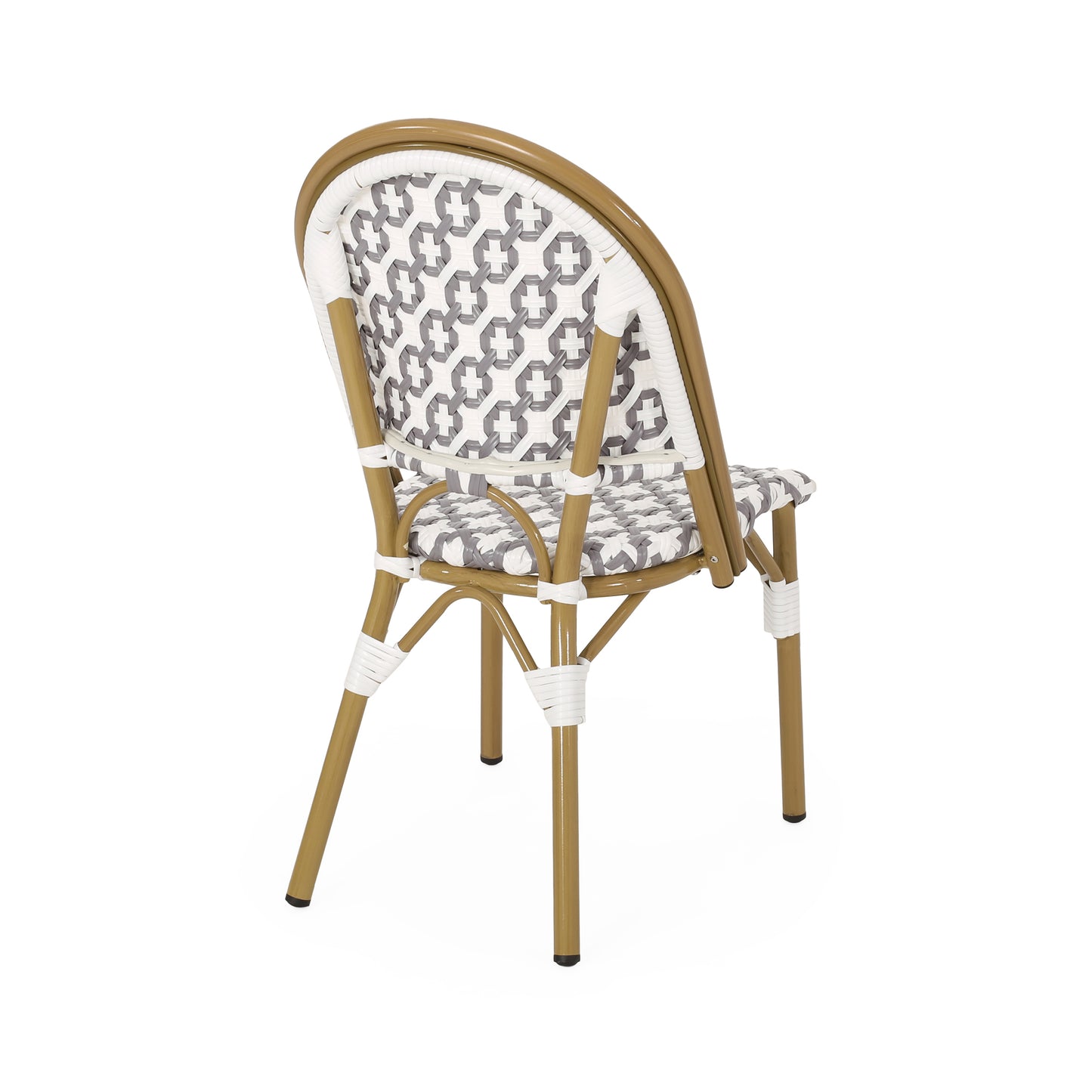 Wicker bistro chair with geometric gray and white seat and back on metallic gold frame