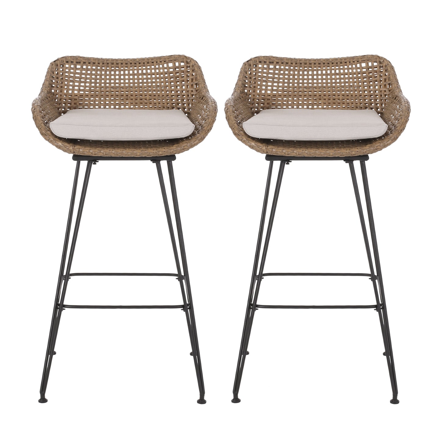Two tan rattan bar stools with cream cushions and black metal hairpin legs
