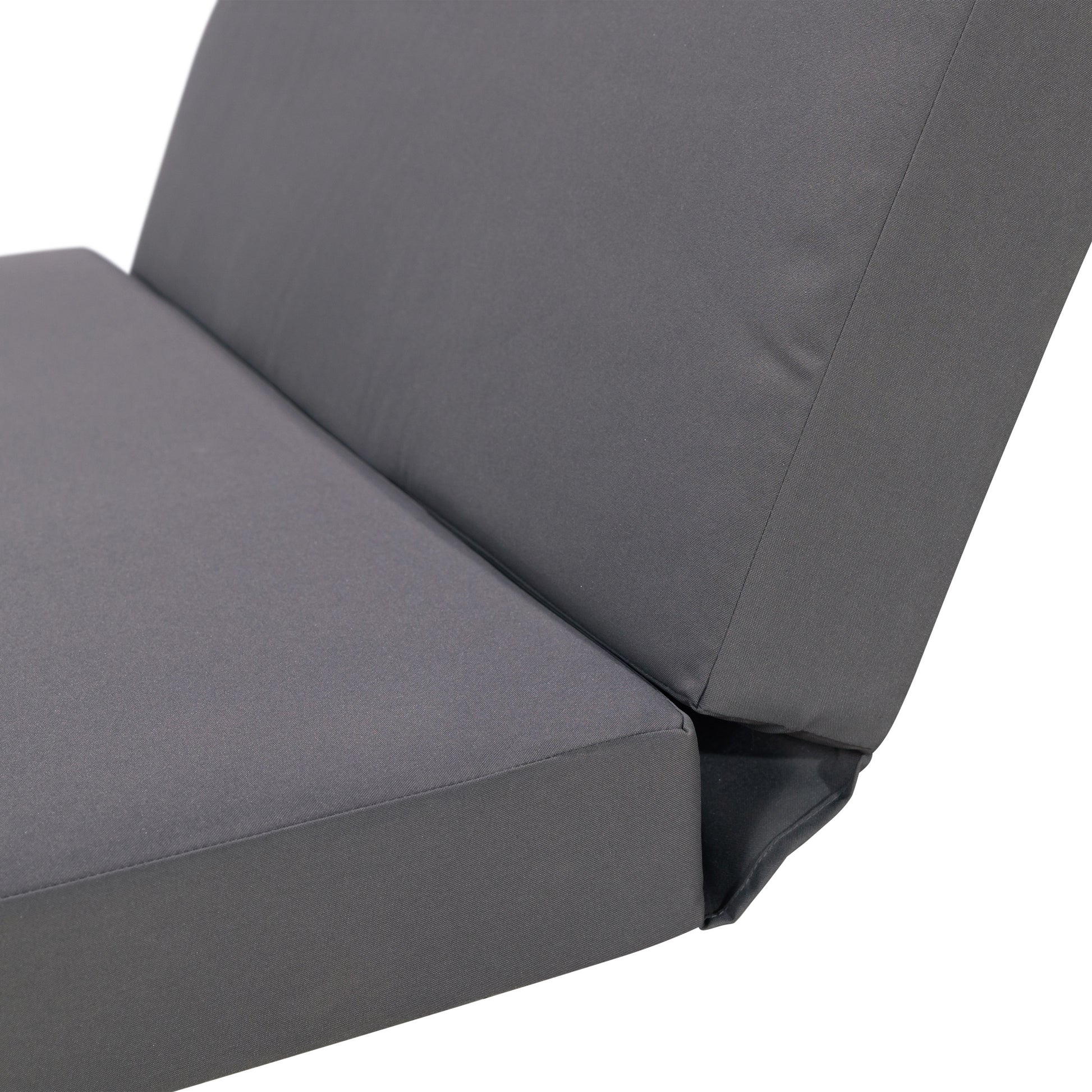 Closeup of a grey outdoor sofa cushion showing textured fabric weave