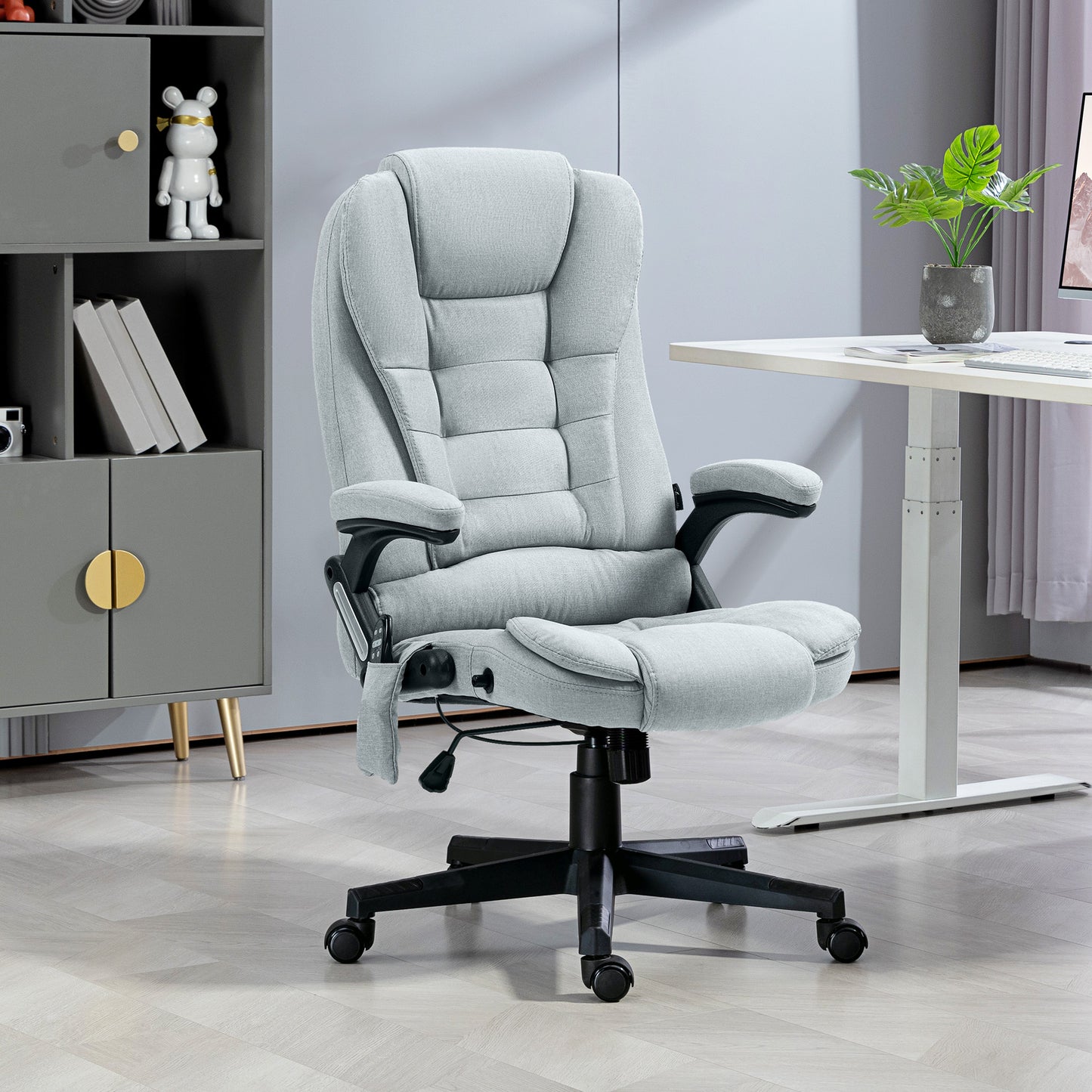 Light gray fabric executive office chair with lumbar support and footrest