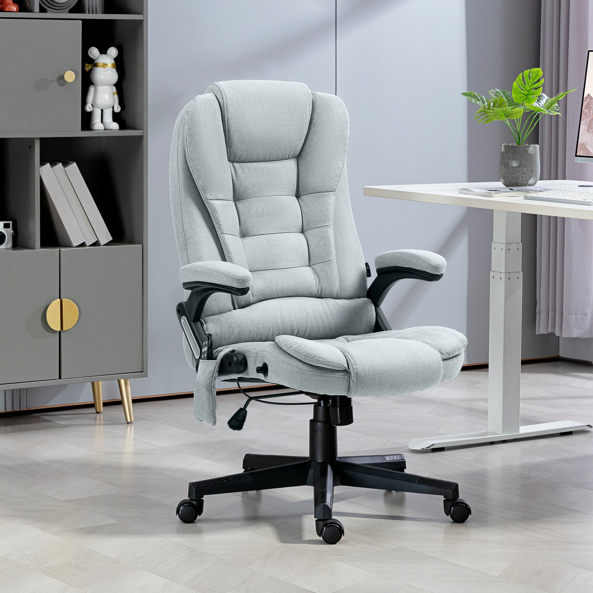Light gray fabric executive office chair with lumbar support and footrest