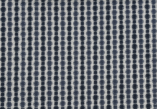 Closeup of textured blue and white geometric pattern fabric