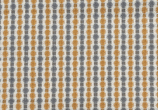 Closeup of a textured woven fabric featuring a repeating geometric pattern in mustard yellow charcoal gray and cream