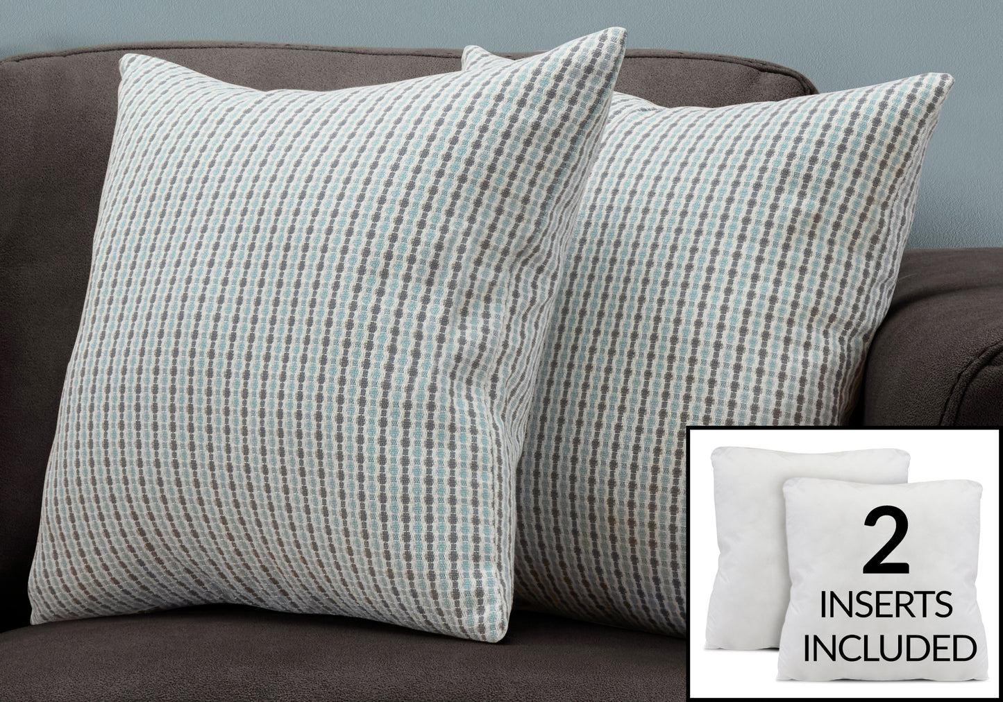 Two decorative throw pillows with a gray and blue geometric pattern on a couch