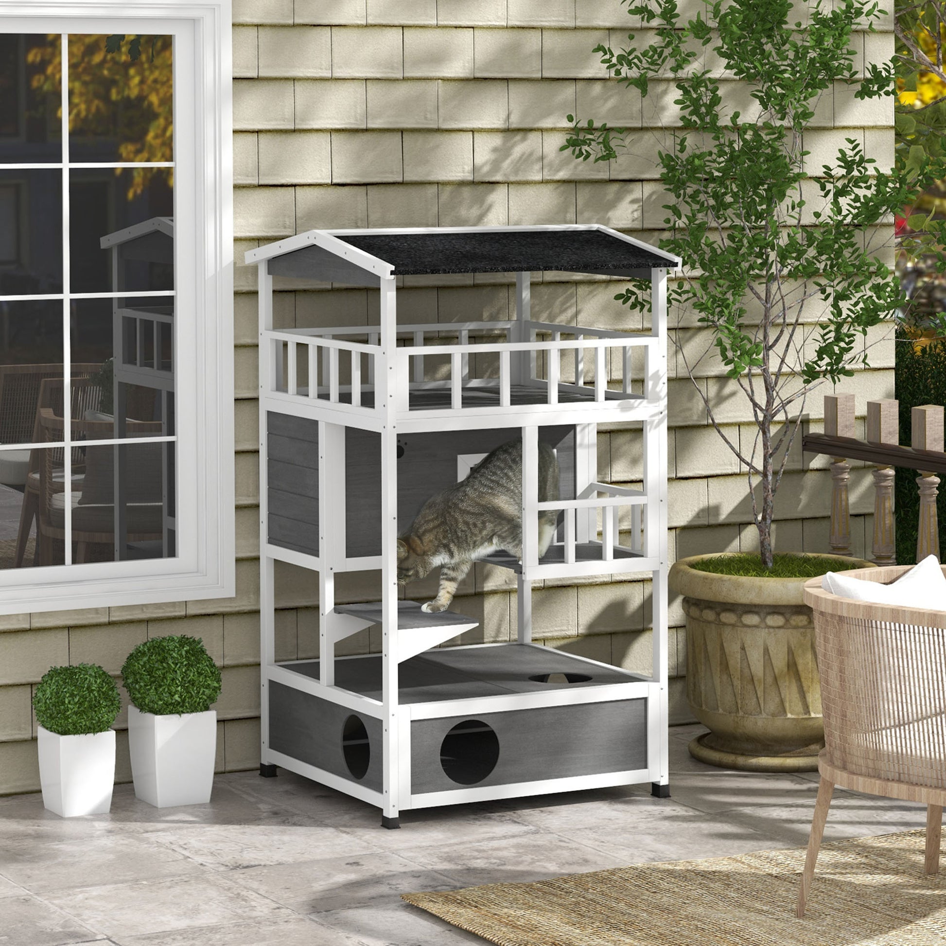 Modern multilevel outdoor cat tree house with integrated scratching posts and enclosed hideaways