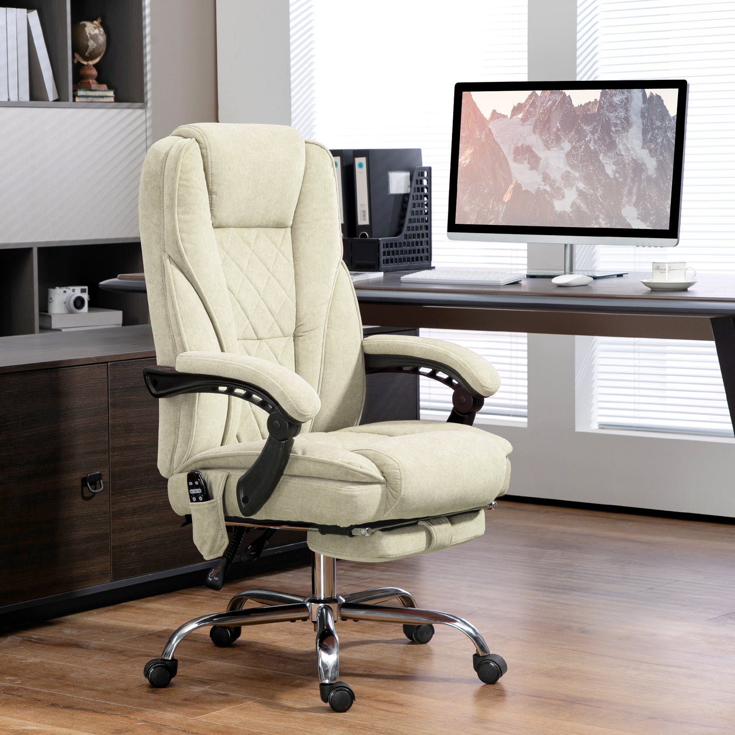 Beige executive office chair with builtin footrest and massage functions for ultimate comfort