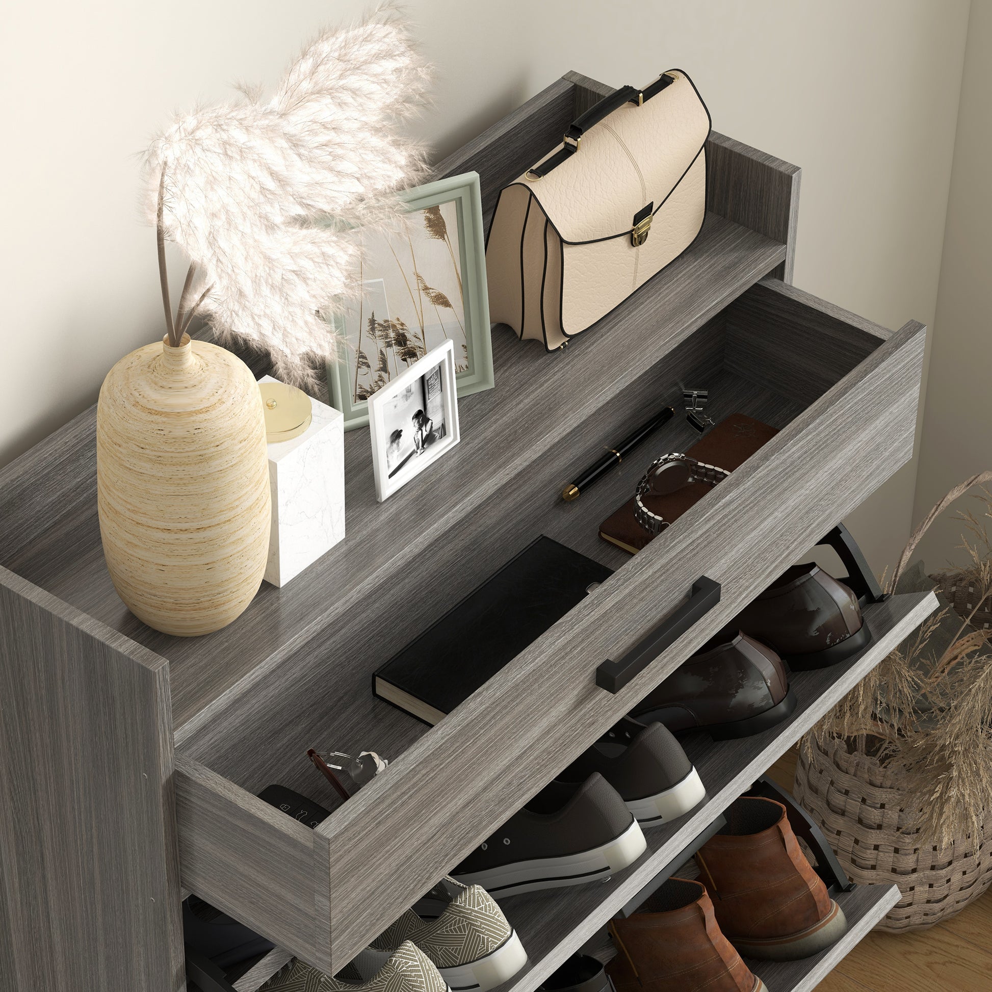 Modern grey wood shoe cabinet with leather handbag and decorative vase