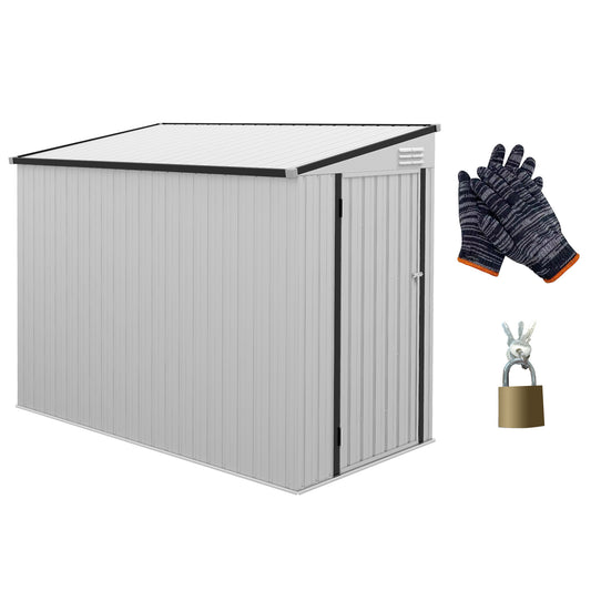 Silver metal garden shed with a sloped roof and a single door