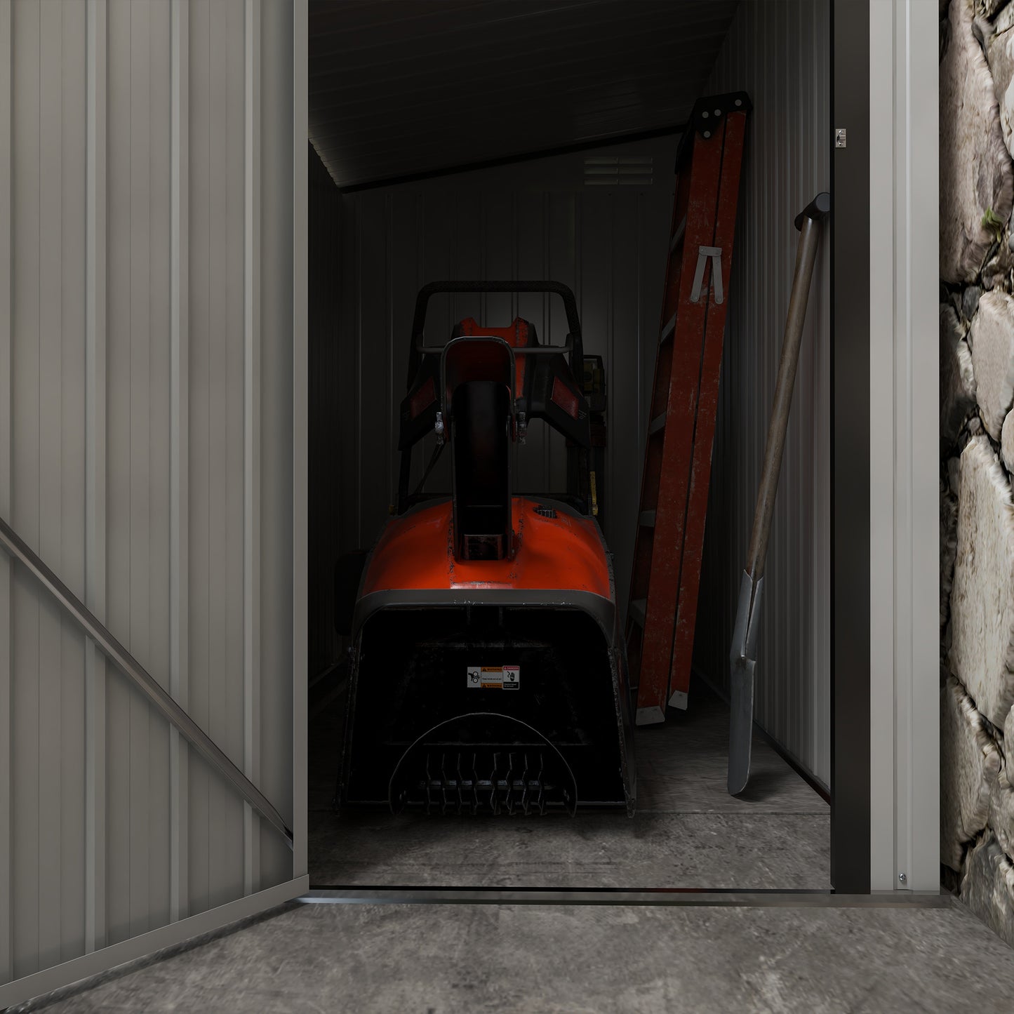 Orange snow blower with black accents stored indoors next to a ladder and shovel
