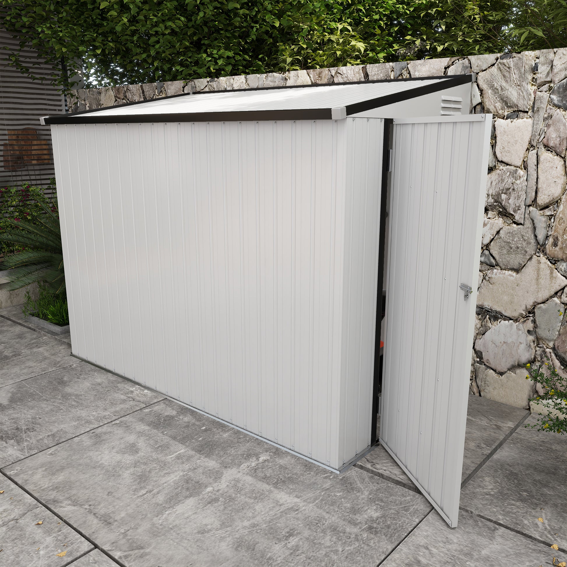 White metal garden shed with a sloped roof and open door ideal for outdoor storage