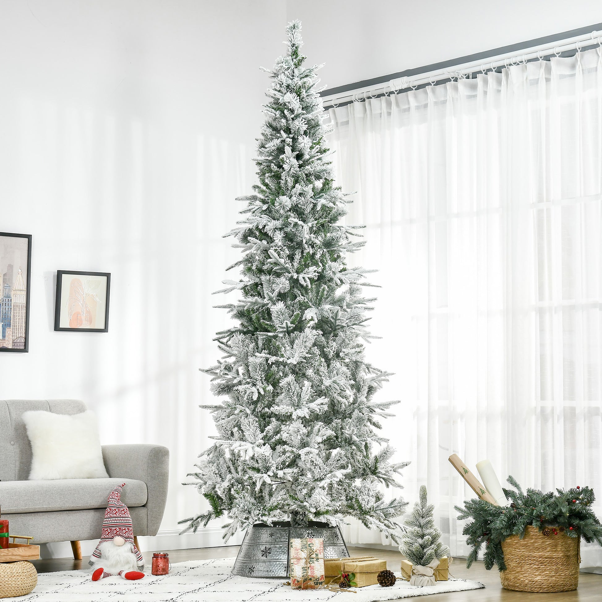 Flocked artificial Christmas tree with realistic branches and frosted tips for festive decor