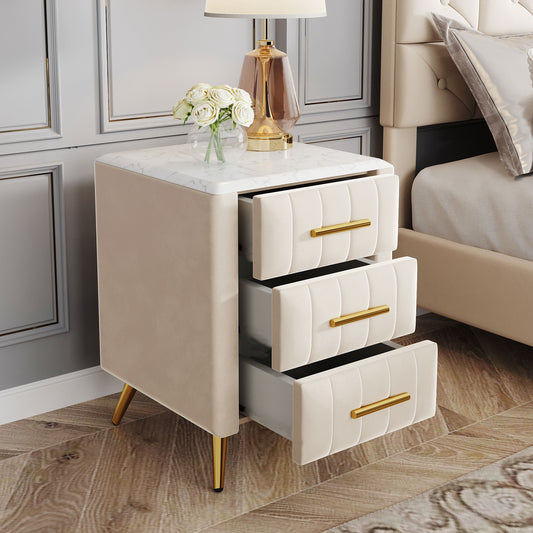 Cream velvet nightstand with marble top and three drawers