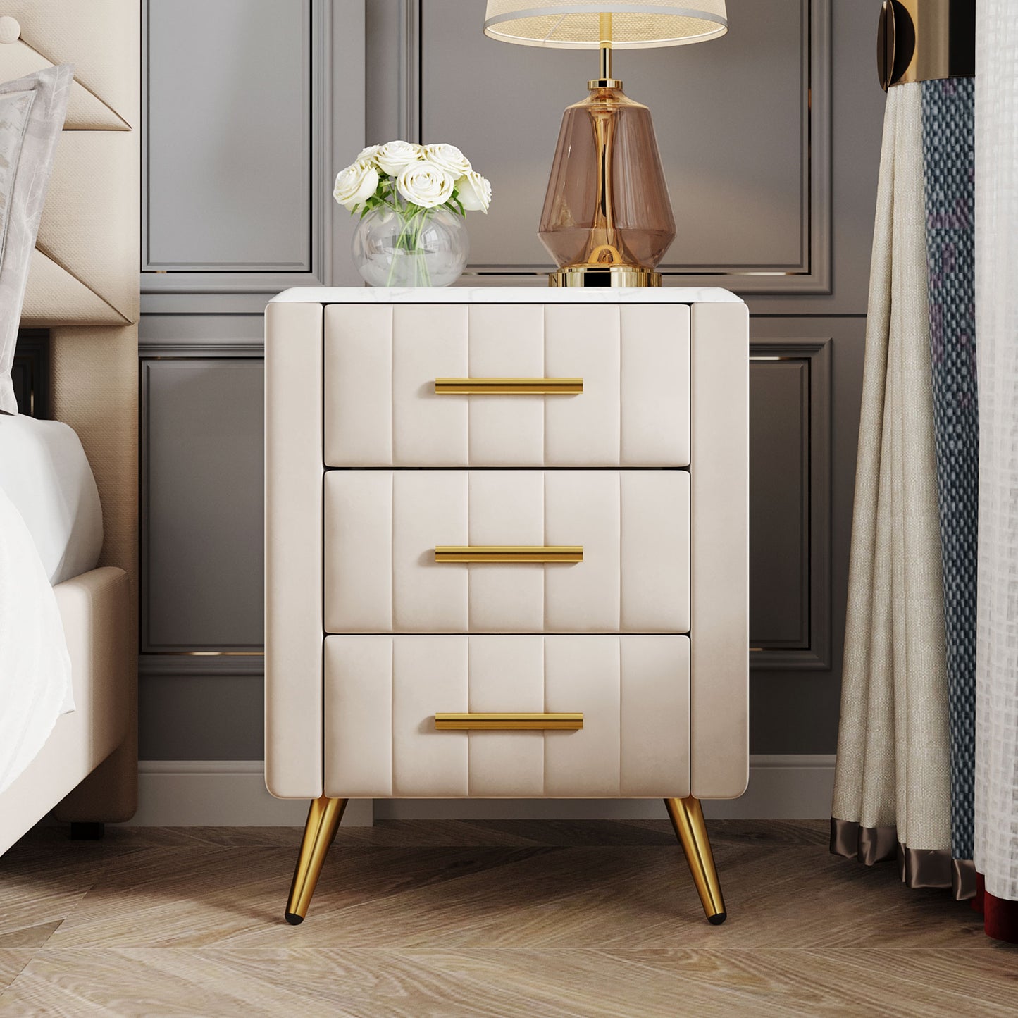 Cream velvet nightstand with gold hardware and tapered legs