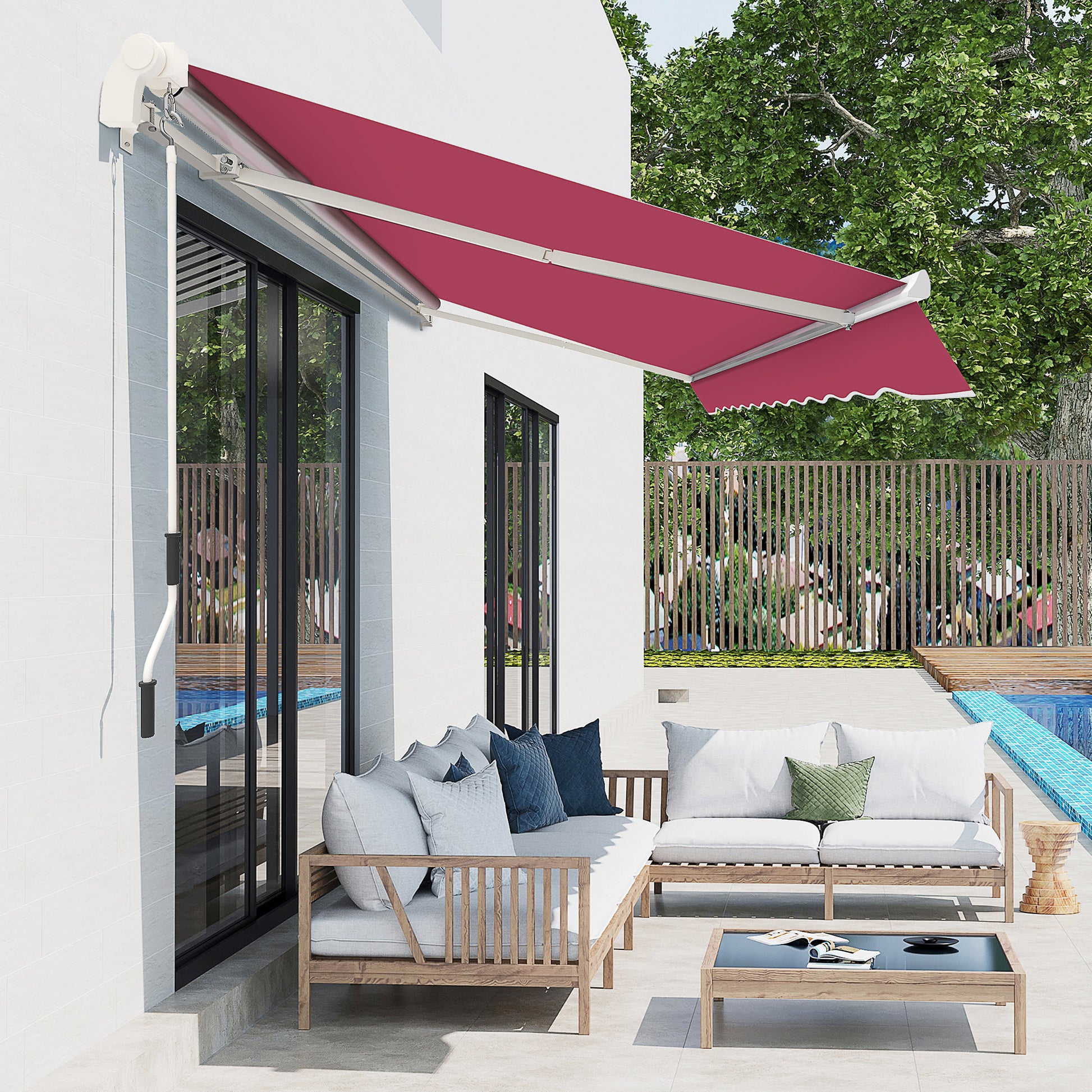 Retractable awning in crimson red mounted on a white exterior wall over sliding glass doors providing shade