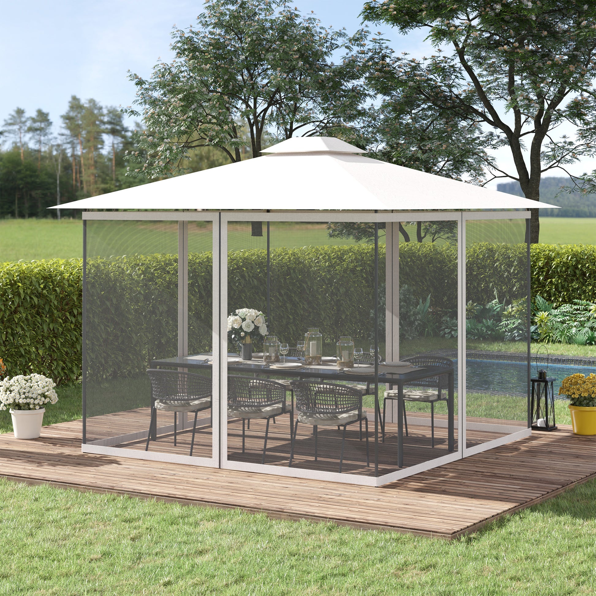 White screened patio gazebo with outdoor dining set on wooden deck