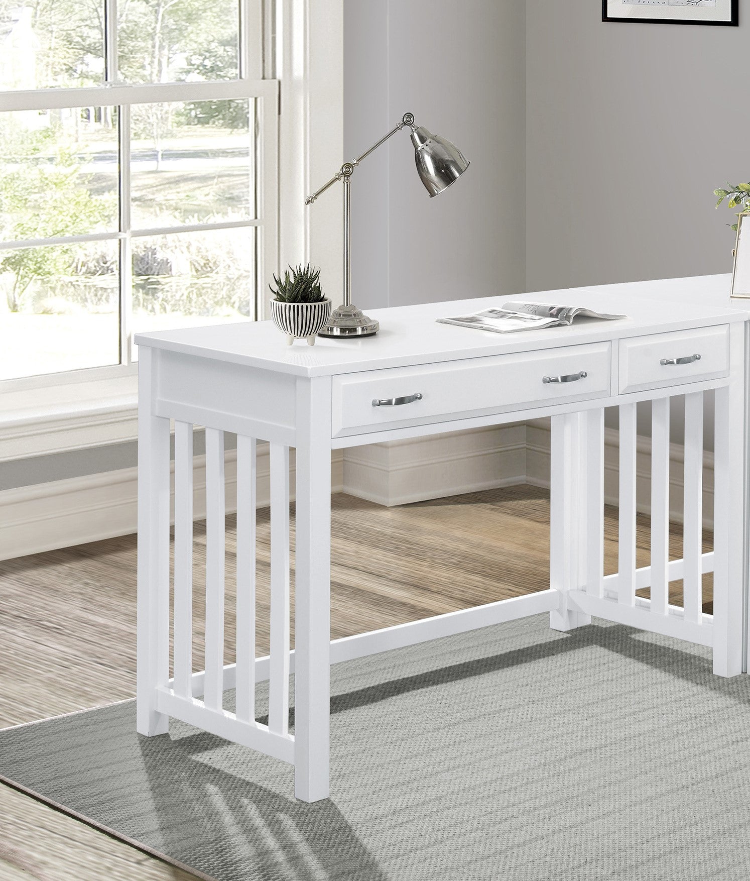 White Mission style desk with three drawers and silver hardware