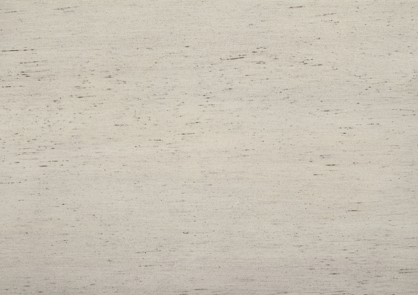 Textured beige fabric with subtle dark flecks perfect for home decor upholstery